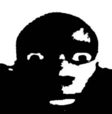 a black and white silhouette of a person 's face with a mask on their face .