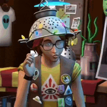 a man wearing glasses and a hat is standing in a room with a pot on his head .