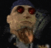 a pixelated image of a man with red eyes sticking his tongue out