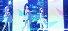 three anime girls are dancing on a stage in front of a city skyline