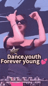 a woman is dancing with the words dance youth forever young