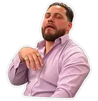 a man with a beard wearing a purple shirt and a ring on his finger