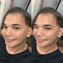 a man in a black shirt is smiling and making a silly face