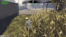 a video game screen shows a man running through a field