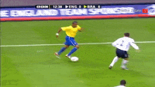 a soccer game is being played between england and brazil