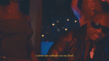 a man wearing sunglasses and a watch says i never see nobody on my level
