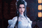 a woman with long black hair and a white dress