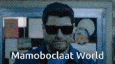 a man wearing sunglasses with the words mamoboclaat world written below him