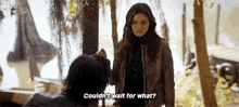 a man and a woman are standing next to each other and the woman is asking the man if he could wait for what .