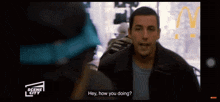 a man is talking to another man with the words hey how you doing