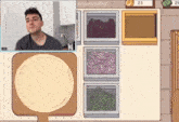 a man is sitting in front of a pizza in a video game that says colapintofiles on the bottom