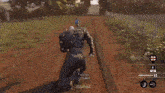 a video game character is standing next to a woman in a field