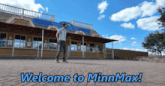 a man is walking in front of a building that says welcome to minn max