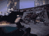 a pixelated image of a person riding a skateboard on a ramp with graffiti on it