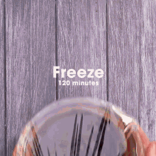 a pot of water is sitting on a stove with a warning that the plate is hot