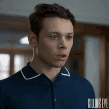 a close up of a man 's face with the word killing eve behind him