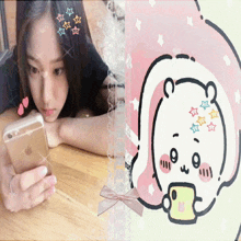a girl is laying on a table looking at her phone