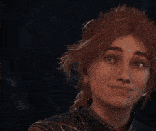 a woman with red hair is making a funny face