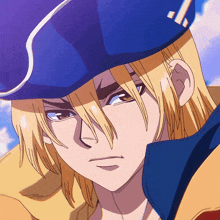 a close up of a person 's face with a blue hat on