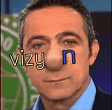a close up of a man 's face with a big nose and the words vizy n written on it .