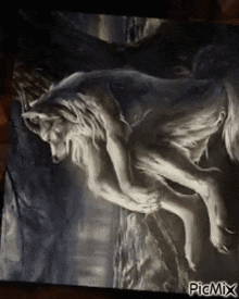 a pillow with a picture of a wolf with wings on it .