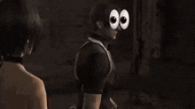 a close up of a person 's face with a pair of cartoon eyes on it .