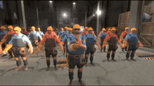 a group of construction workers are standing in a line