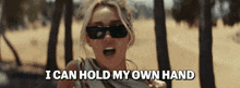 Miley Cyrus Flowers GIF - Miley Cyrus Flowers I Can Hold My Own Hand GIFs