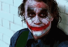 Joker Bored GIF - Joker Bored Tongue Out GIFs