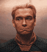 a close up of a man 's face and neck