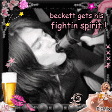 a picture of a woman drinking from a bottle with the caption " beckett gets his fightin spirit ! "
