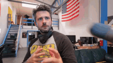 a man wearing headphones and a t-shirt that says ' o'reo ' on it