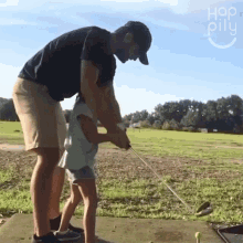 Helping You Swing The Golf Club Happily GIF - Helping You Swing The Golf Club Happily Golf Swing GIFs