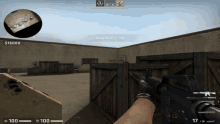 a person holding a gun in a video game with warmup 1:50
