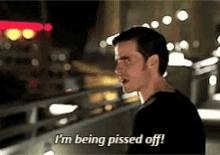 a man says i 'm being pissed off in a blurry photo