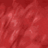 a red background with a drawing of a person in a suit