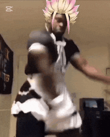 a man in a maid outfit is dancing in a room with a sign that says " black lives matter " on it