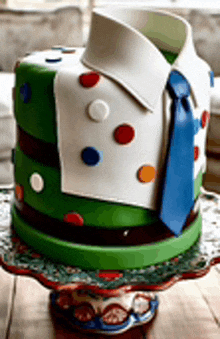 a cake that looks like a shirt and tie with polka dots