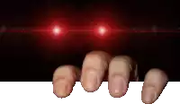 a close up of a person 's hand holding a sign with red lights behind them