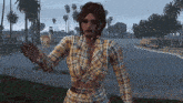 a woman in a plaid shirt is standing in front of a lake