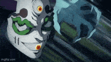 a close up of a cartoon character 's face with a white mask and green eyes .