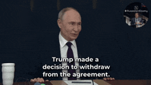 a man in a suit and tie says that trump made a decision to withdraw from the agreement