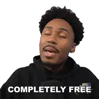 a man in a black hoodie says completely free with his eyes closed
