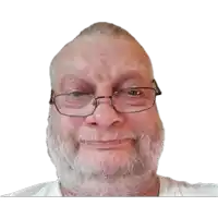 a man with a beard wearing glasses and a white shirt