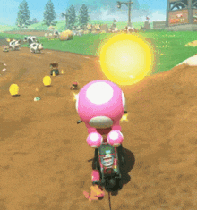 a pink toad is riding a motorcycle on a dirt track