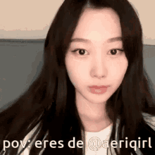 a close up of a woman 's face with the words pov : eres de @aerigirl .