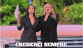 two women are standing next to each other with the words crederci sempre written on the bottom