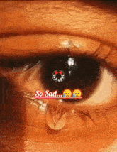 a close up of a woman 's eye with a tear coming out of it and the words so sad written above it