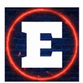 a white letter e is in a red circle on a brick wall