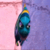 a blue fish is peeking out from behind a wall .